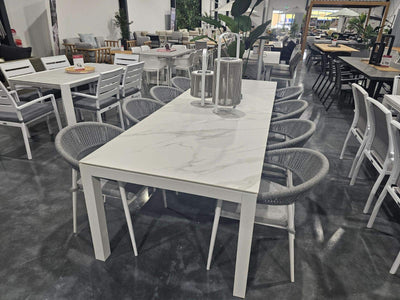FLOORSTOCK SALE - Danli Ceramic Table with Nivala Dining Chairs - 9pc Outdoor Dining Setting_1