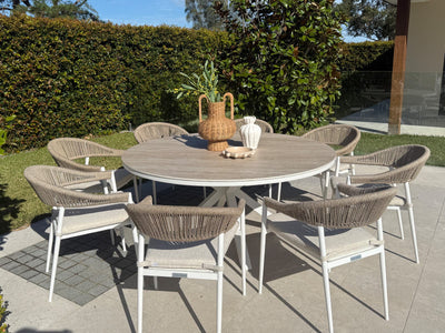 Adele Ceramic Round Table & Nivala Chairs | Outdoor Dining Setting in White / Travertino / Biscuit / 9pc 160cm_1