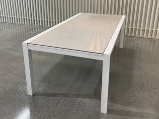 Adele Extension Outdoor Dining Table in White / Light Grey - close-up.