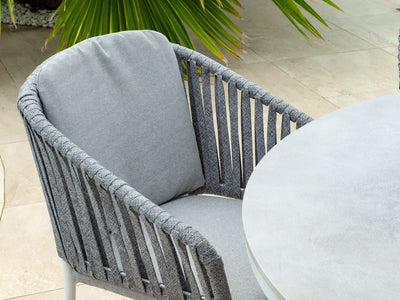 Adele Ceramic Round Outdoor Dining Table in White / Light Grey / 160cm - close-up.