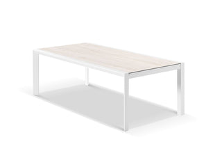 Adele Extension Outdoor Dining Table in White / Travertino - close-up.