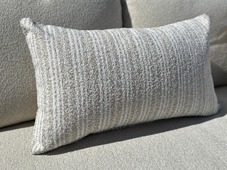 Frankie Stripe Outdoor Bolster Cushion in Oat - close-up.