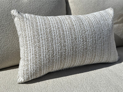 Frankie Stripe Outdoor Bolster Cushion in Oat - close-up.
