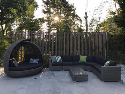 Lotus Outdoor Daybed in Moonscape / Canvas Coal - back view.