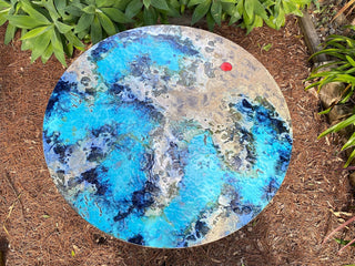 Domiziani Lava Stone Round Outdoor Dining Table in Luna Rossa - top view.