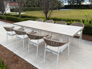 Modena Table & Nivala Chairs | Outdoor Dining Setting in White / Travertino / Biscuit / 9pc 290cm_1