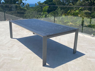 Mona Extension Outdoor Dining Table in Charcoal / C57 - close-up.