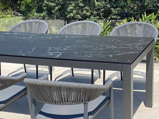 Danli Ceramic Table with Nivala Chairs 9pc Outdoor Dining Setting_6