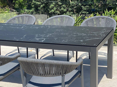Danli Ceramic Table with Nivala Chairs 9pc Outdoor Dining Setting_6