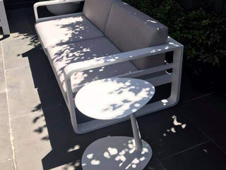 Petal Outdoor Side Table in White - side view.