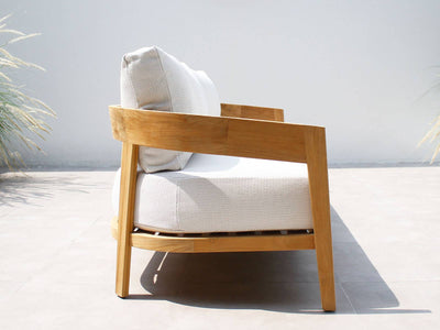 Ubud Outdoor Armchair in Teak / Lopi Marble - side view.